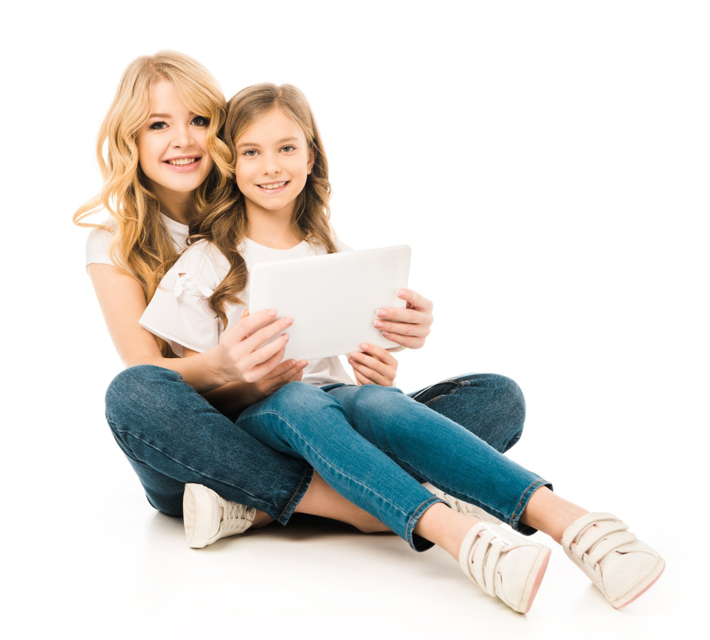 mom and daughter using internet on a tablet together