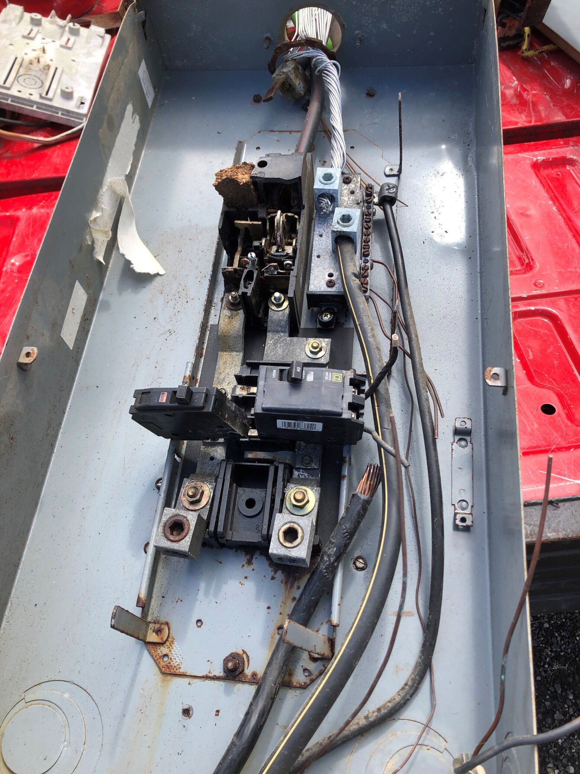A box with a bunch of wires coming out of it