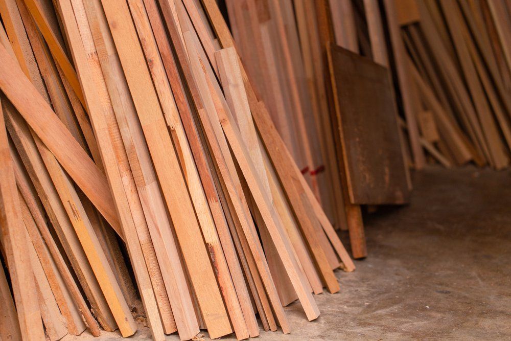 Pile of Wooden Planks in a Storage Area — Sly Bros in Woodburn, NSW