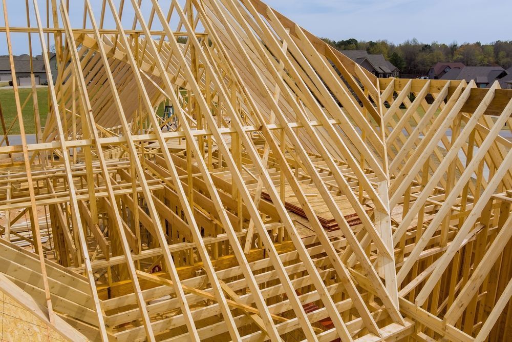 Wooden Roof Frame of a House Under Construction — Sly Bros in Lismore, NSW