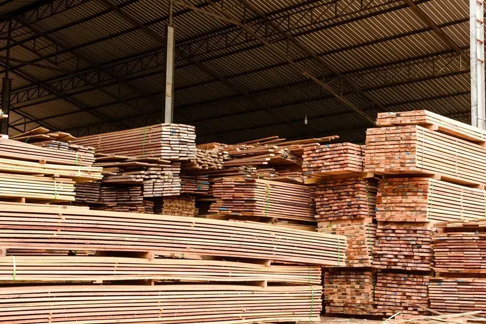 Stacks of Lumber Inside a Warehouse — Sly Bros in Woodburn, NSW