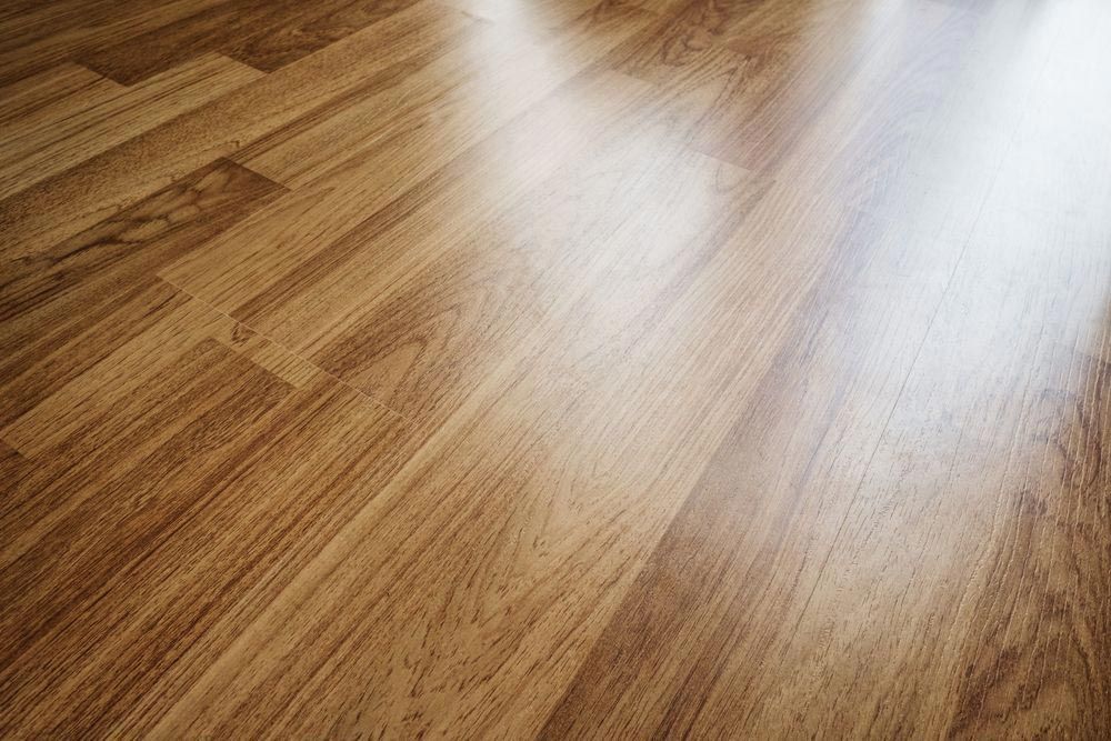 Wooden Floor With a Glossy Finish — Sly Bros in Mullumbimby, NSW