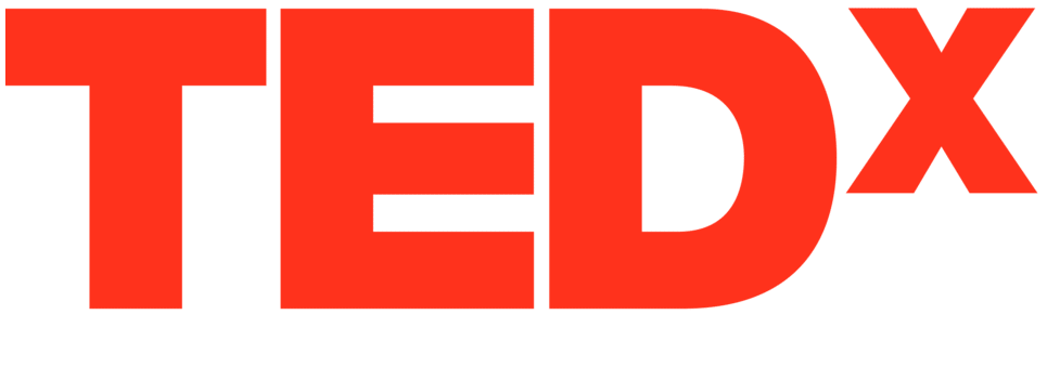 A red tedx logo on a white background