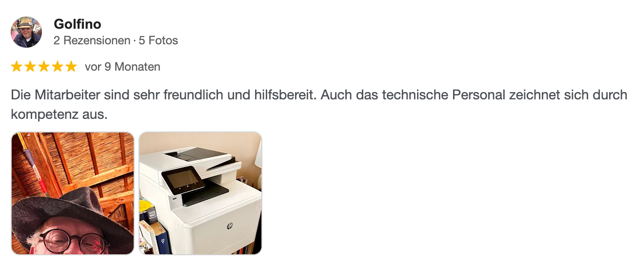 Rezension mit Benutzerfoto und Foto eines Druckers.
