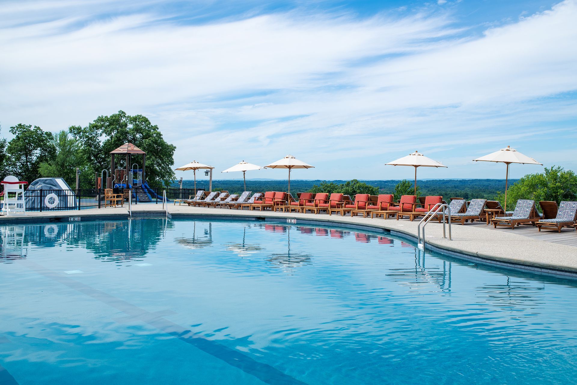Vegas-style pool with splash pad in the background