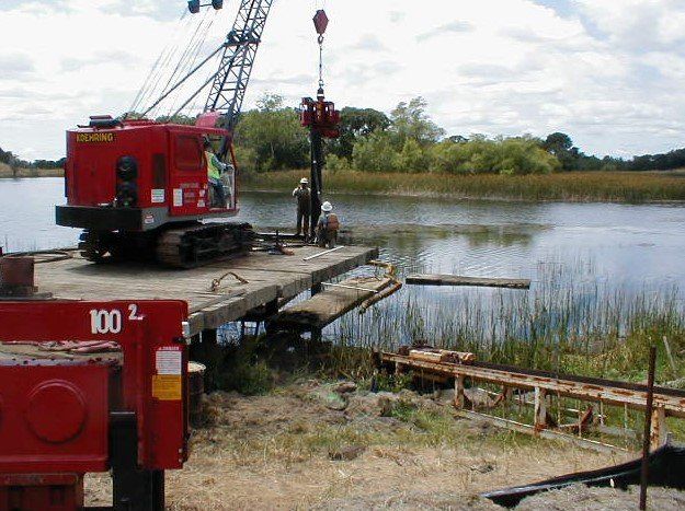 Workers next to large body of water — Santa Rosa, CA — Reese & Associates