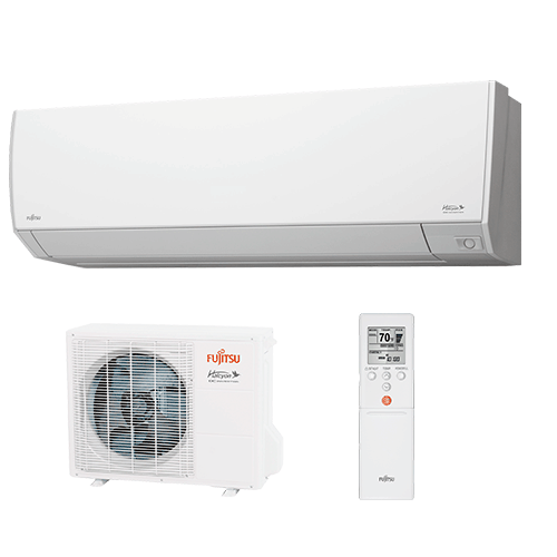 A wall mounted air conditioner with a remote control.