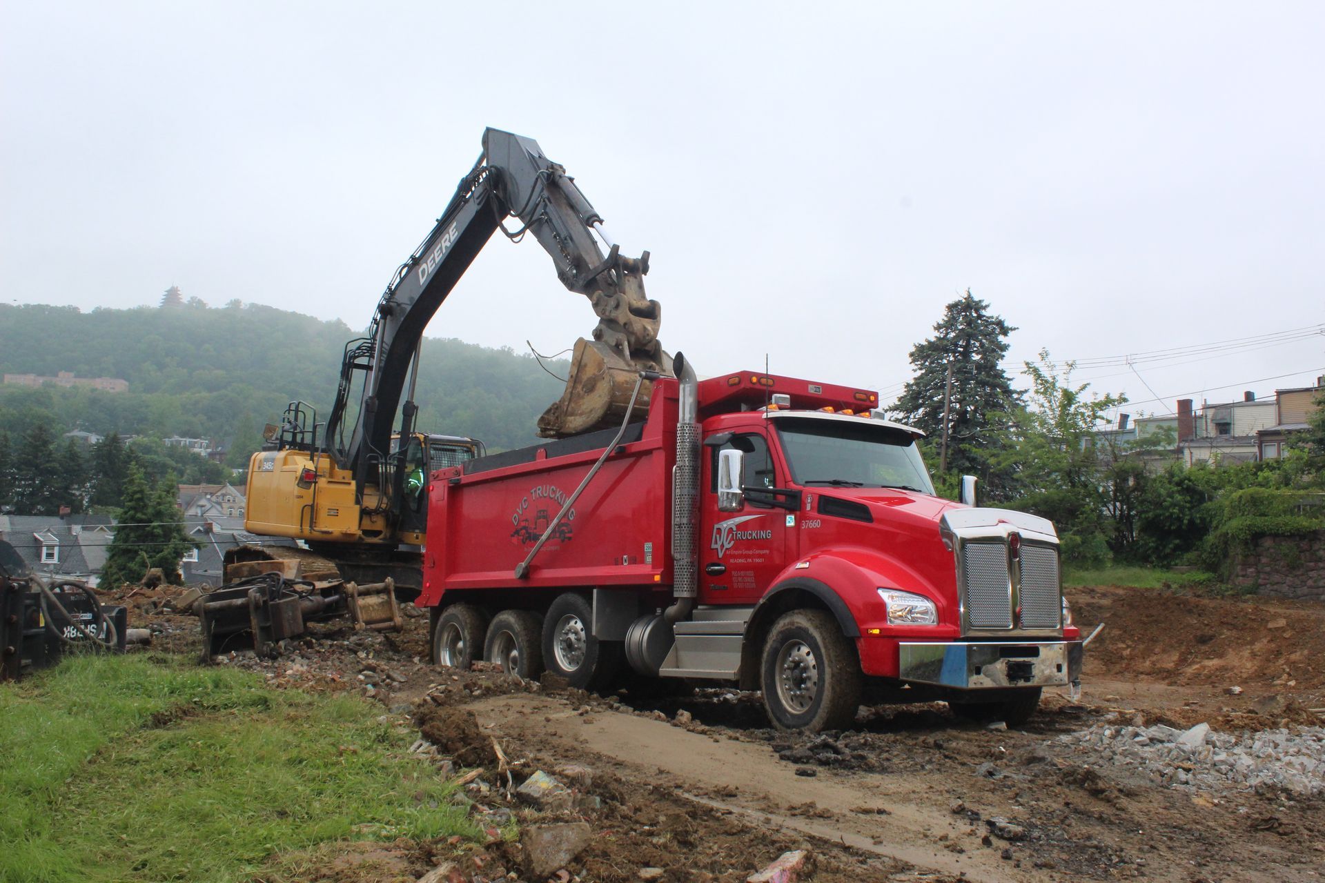 Tri-axle dump truck at East Reading Pool Demolition.
