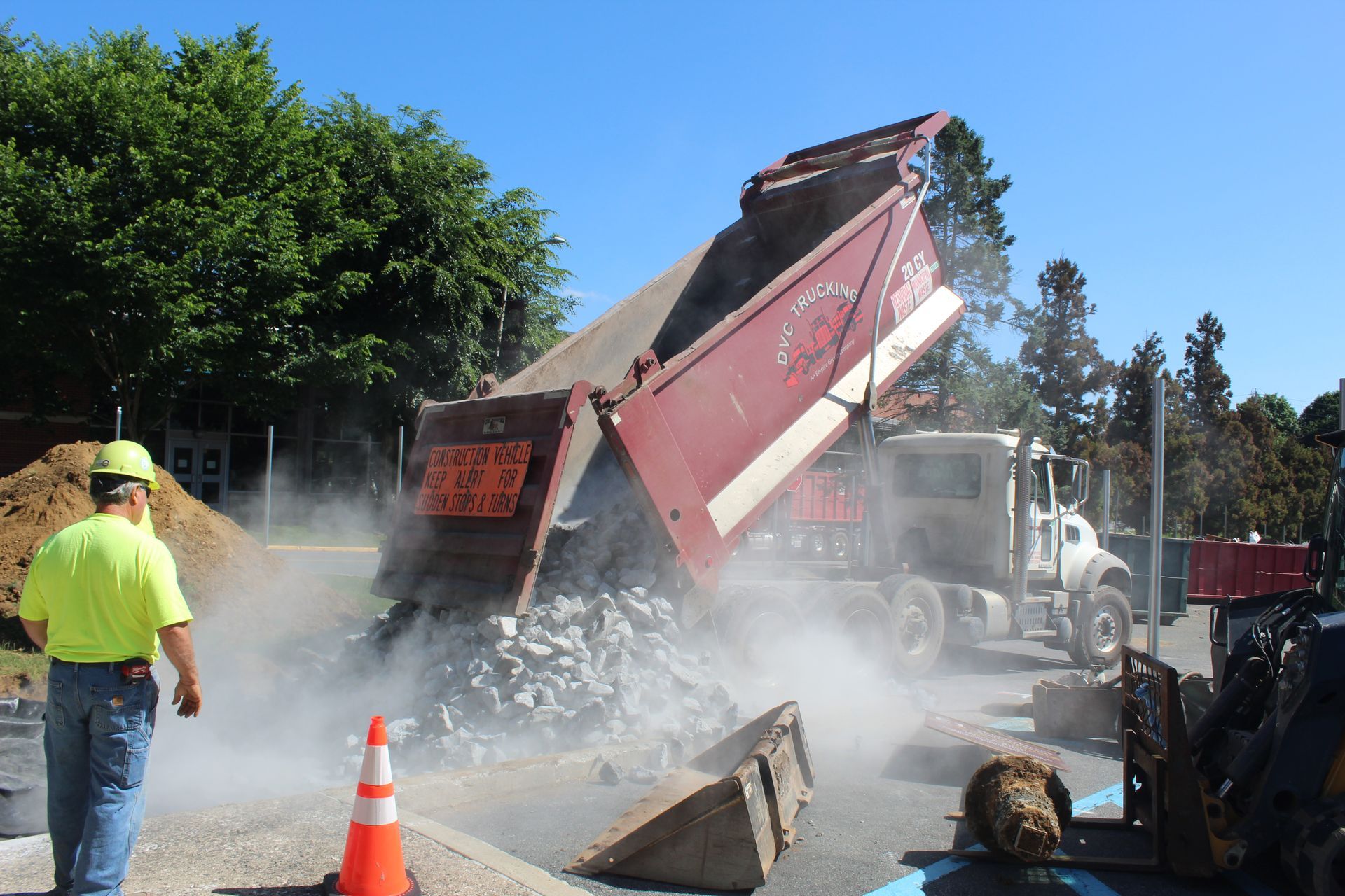 The rest of the stone to be spread out for the new construction entrance.