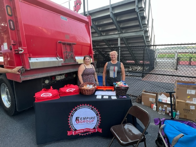 Mitzi and Lauren at Empire Group table at NNO 2022