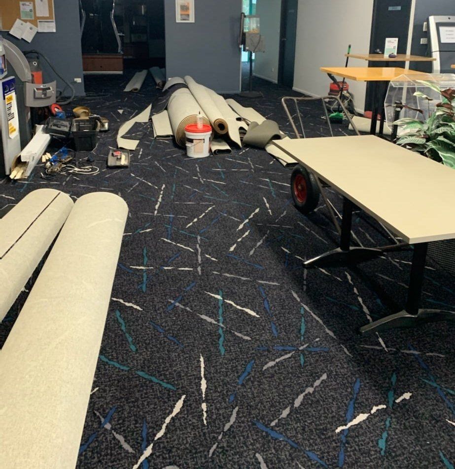 During Carpet Install — Flooring Supply & Installation In Port Macquarie, NSW