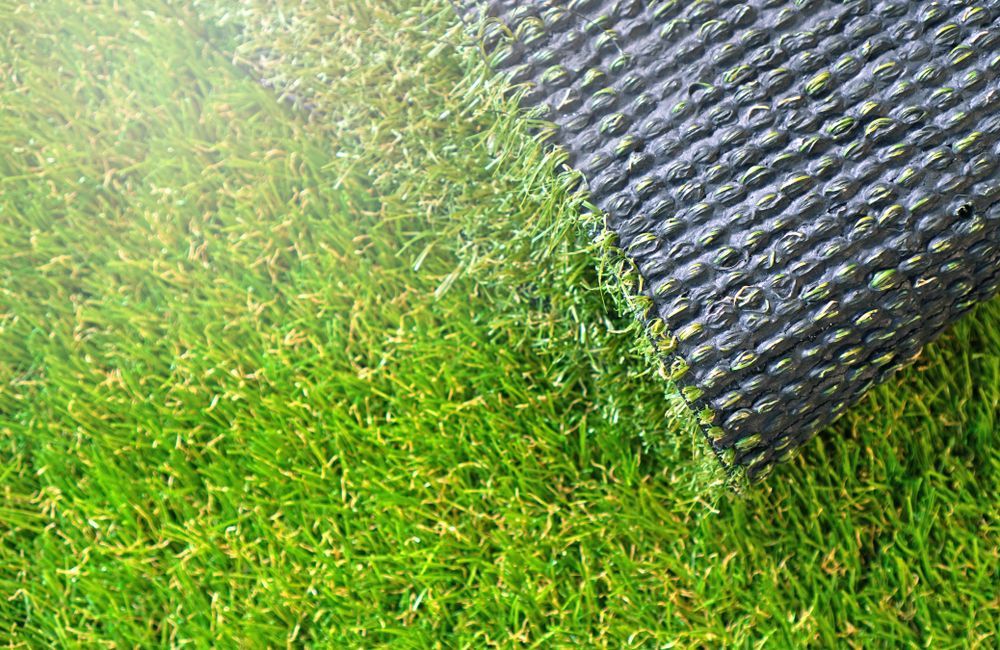 Artificial Green Turf Partially Rolled Out — Geoff Thompson's Independent Flooring Centre in Laurieton, NSW