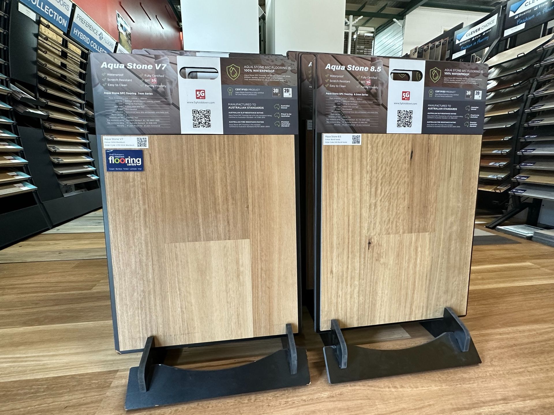 Two Wooden Boards Are Sitting on Display in A Store — Geoff Thompson's Independent Flooring Centre In Port Macquarie, NSW