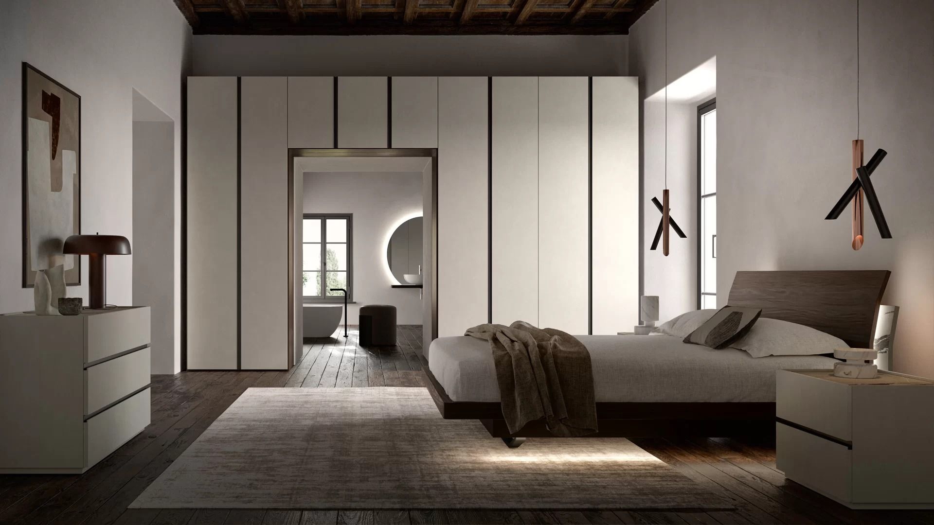 Camera da letto con un grande armadio bianco, letto e cassettiera. Una porta conduce a un'altra stanza con specchio e finestra.