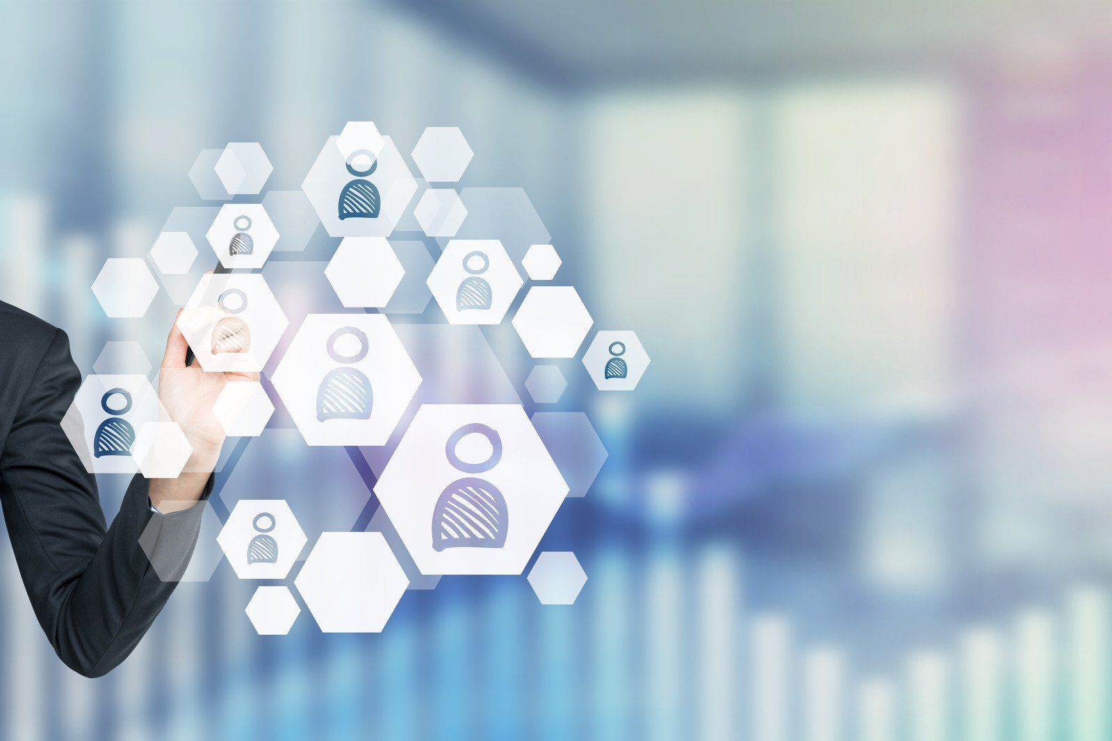 A man is pressing a button on a virtual screen.