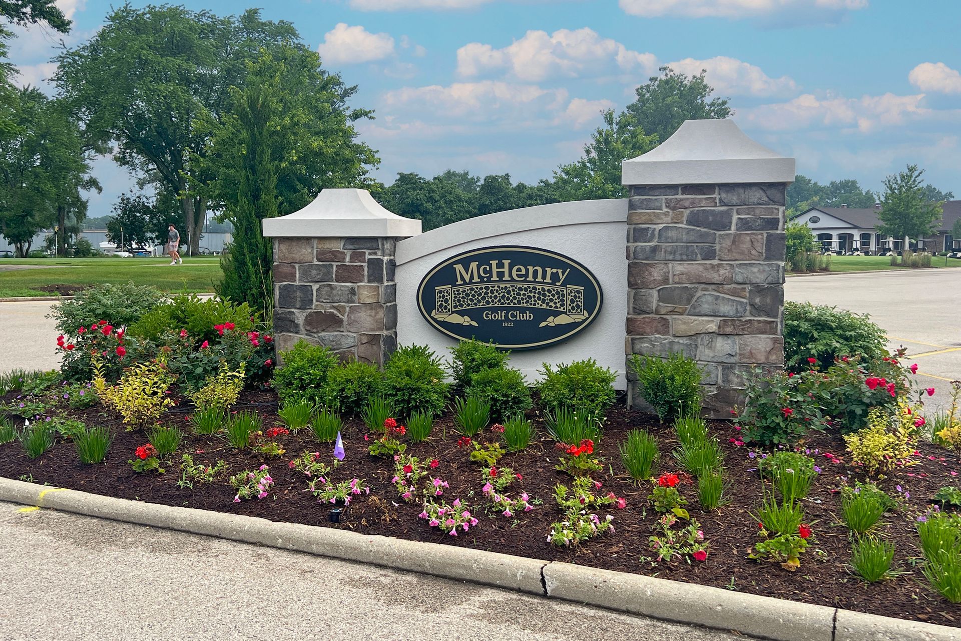 A stone entrance sign reading 