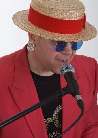 Elton John Tribute Act Aston Management