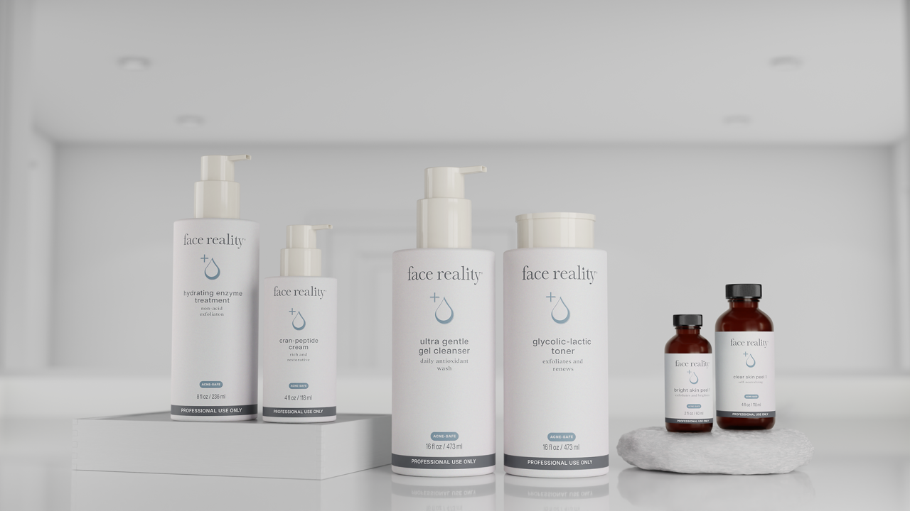 A group of bottles of cosmetics are sitting on a table.