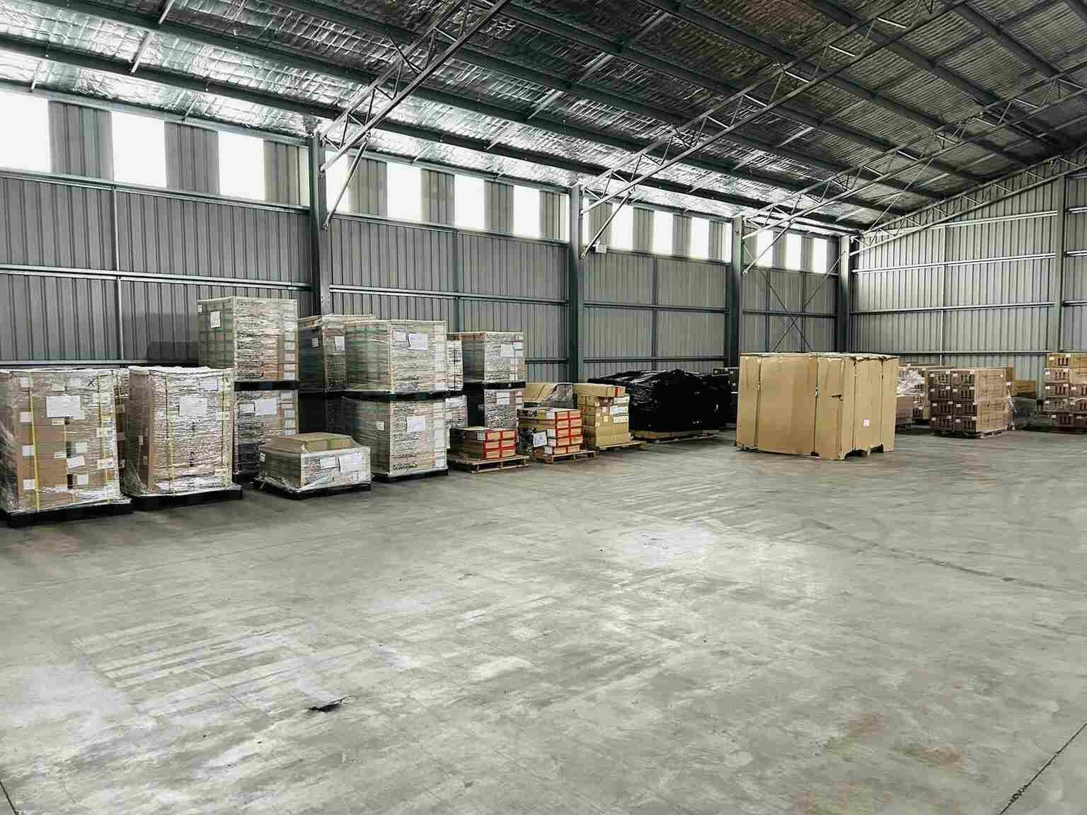 Large Warehouse Filled With Lots of Boxes and Pallets — Transforce in Orange, NSW