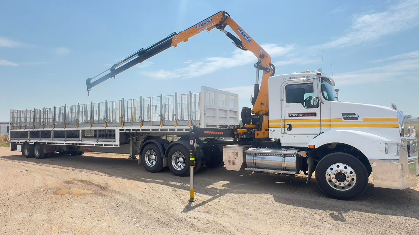 Semi Truck With a Crane Attached to It is Parked on a Dirt Road — Transforce in Wellington, NSW