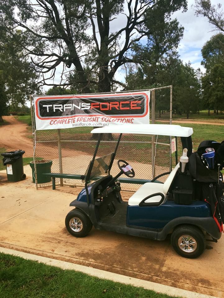 Golf Cart With a Sign on Top of It is Parked in a Park — Transforce in Orange, NSW