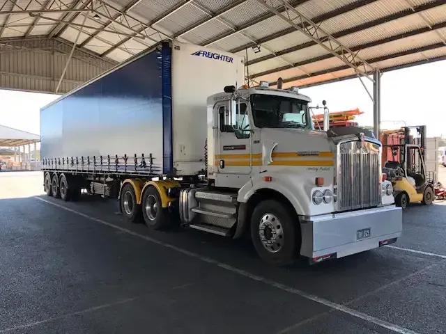 Semi Truck is Parked Under a Roof in a Parking Lot — Transforce in Broken Hill, NSW