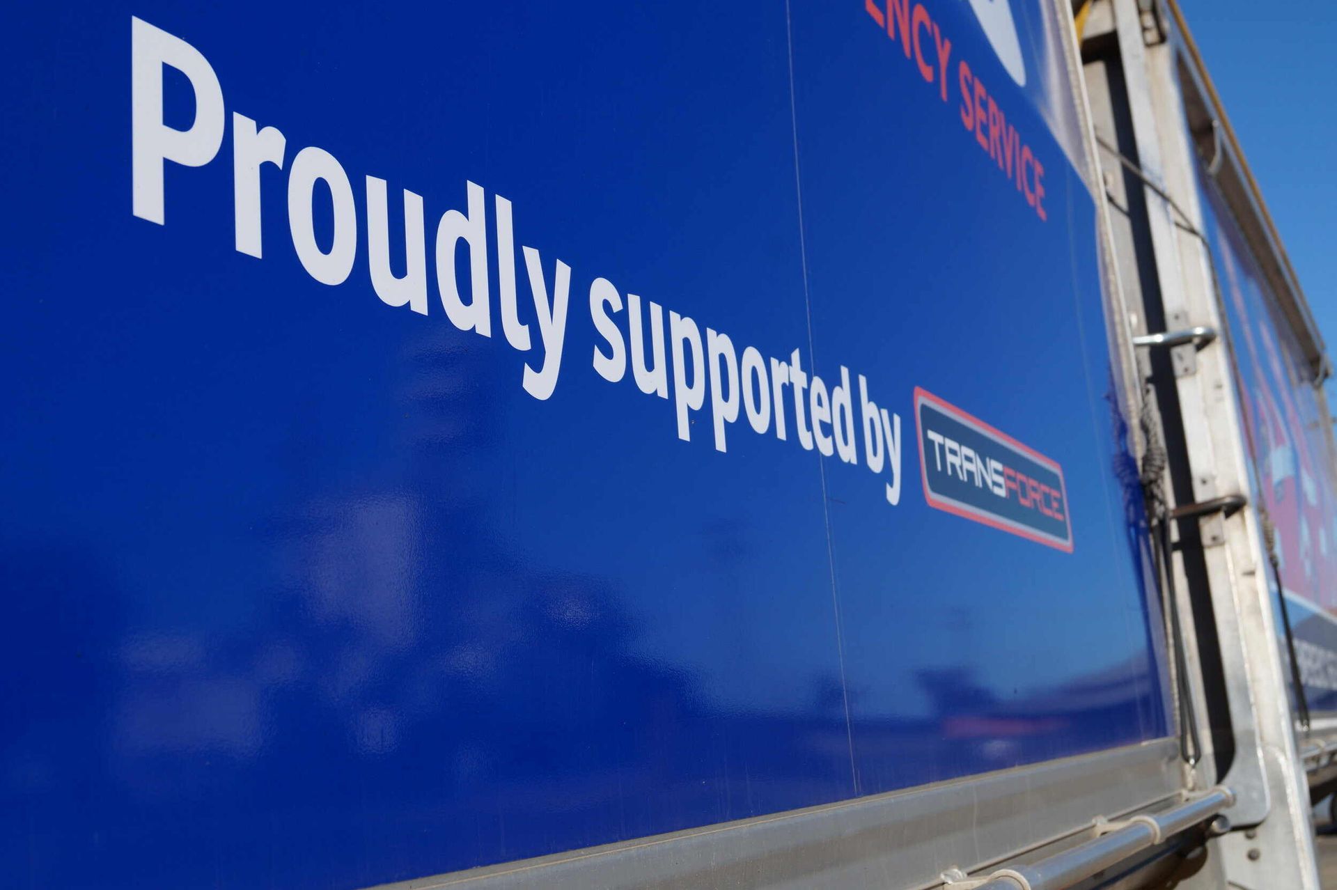 Blue Truck With the Words Proudly Supported by on It — Transforce in Dubbo, NSW