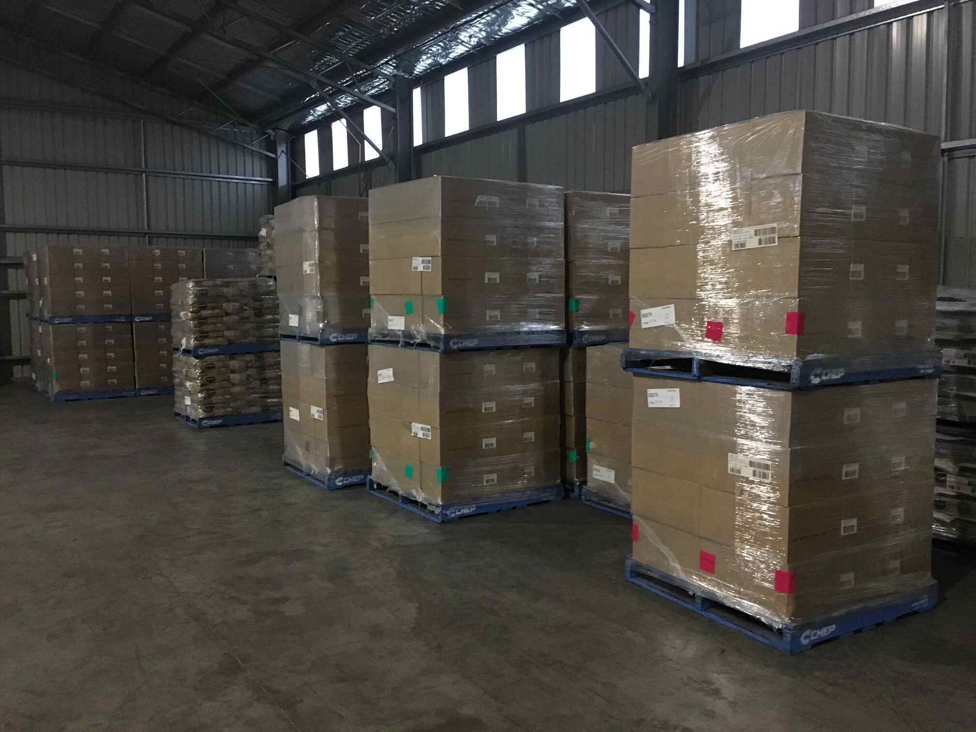 Warehouse Filled With Lots of Boxes and Pallets — Transforce in Dubbo, NSW