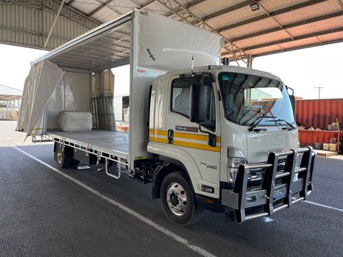 White Truck is Parked in a Parking Lot Under a Roof — Transforce in Parkes, NSW