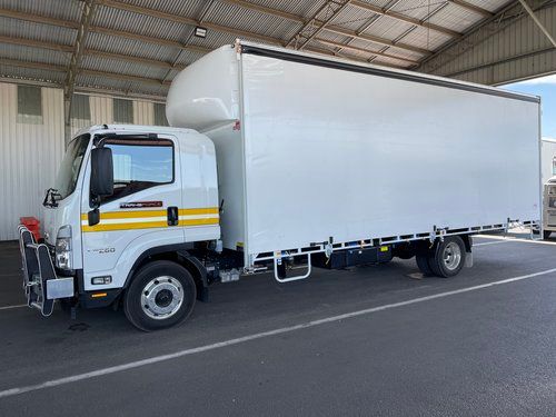 White Truck is Parked in a Parking Lot Under a Roof — Transforce in Bathurst, NSW