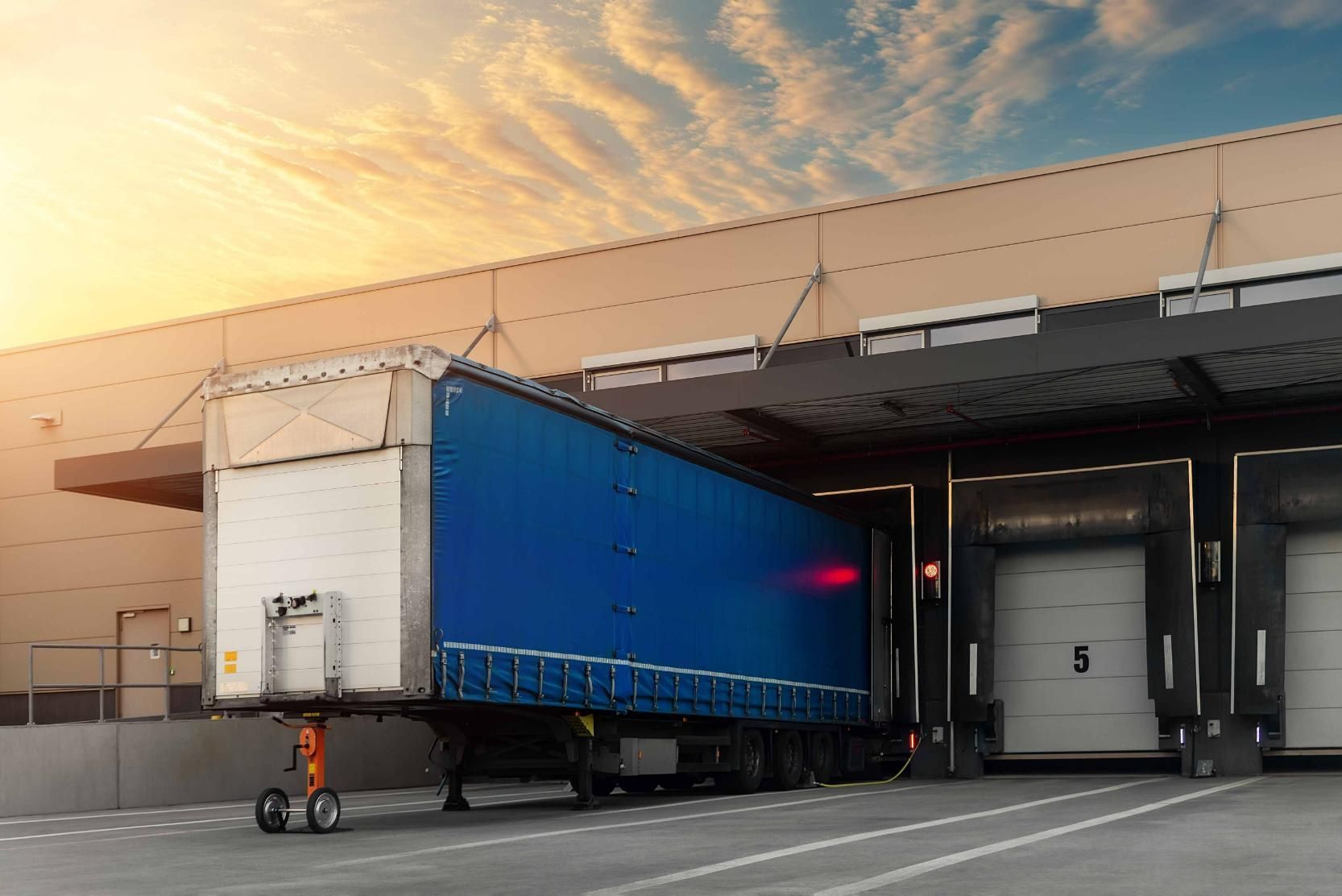 Blue Semi Truck is Parked in Front of a Warehouse — Transforce in Cobar, NSW