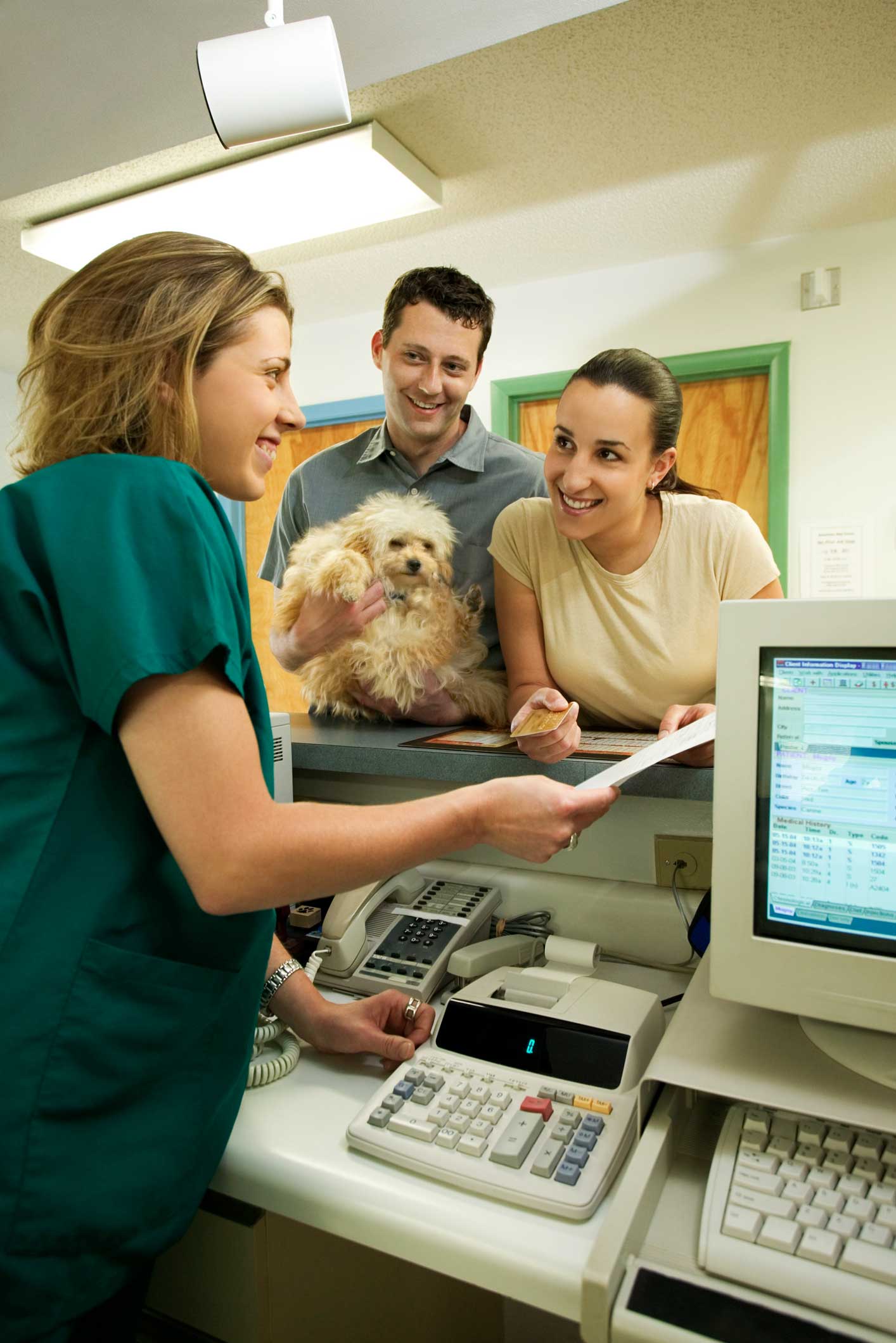 Dogs Vet — Nurse Instructing The Patient In Westland, MI