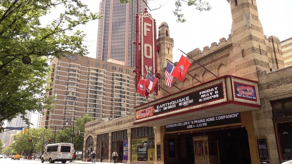 A large building with a sign that says fox on it at Marq on Ponce.