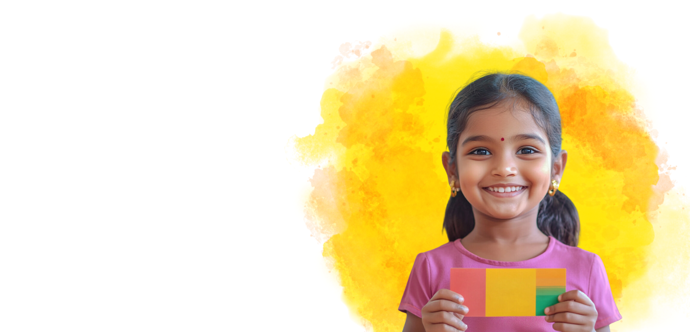 A happy child holding a heart-shaped paper cutout