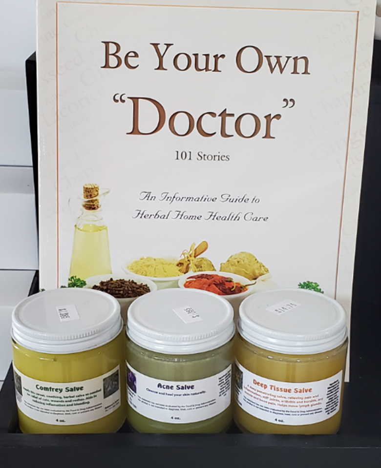 Three jars are sitting next to a book titled be your own doctor.