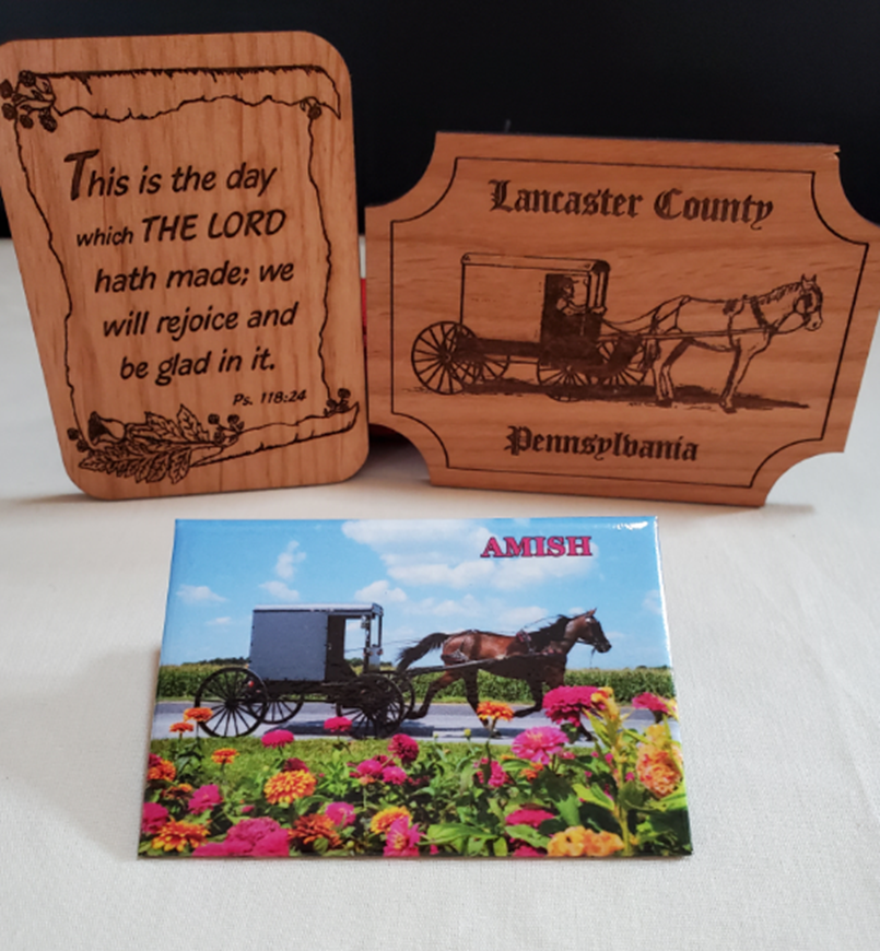 A wooden sign that says this is the day with the lord