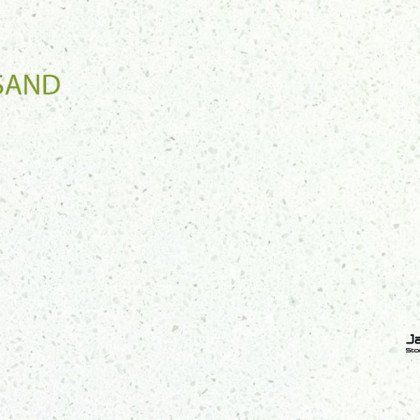 A close up of a white granite counter top.