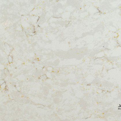 A close up of a white marble counter top.