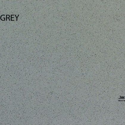 A close up of a grey granite counter top