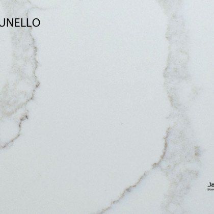 A close up of a white marble counter top