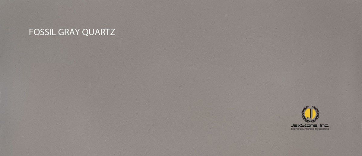 A piece of paper that says fossil gray quartz on it