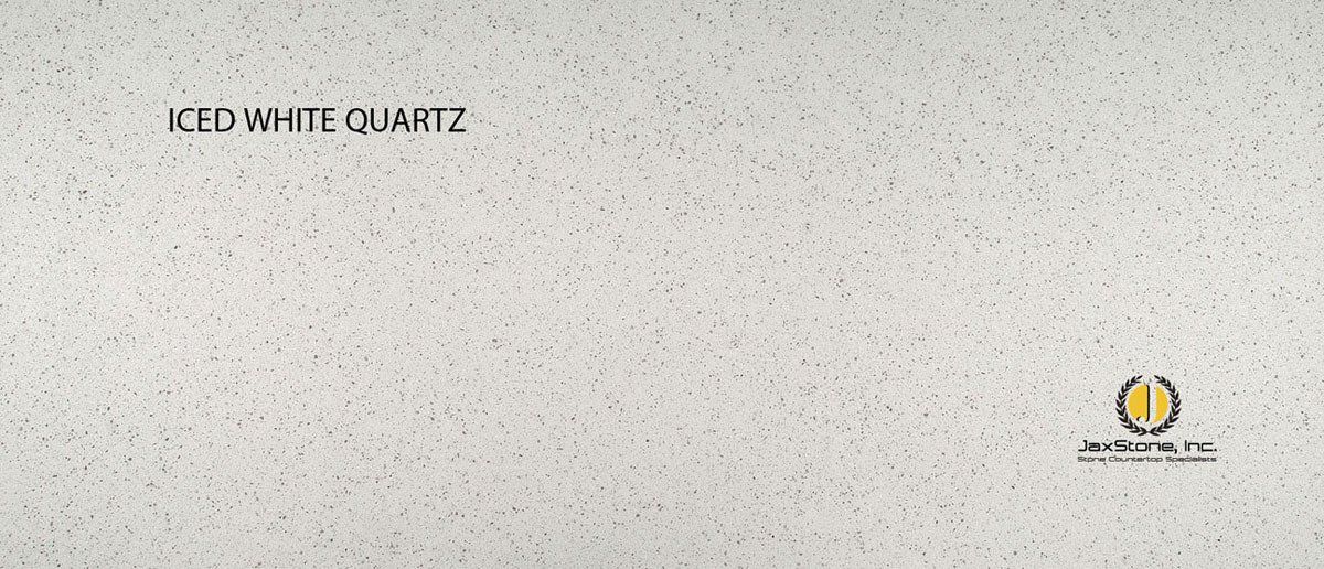 A close up of a white quartz counter top