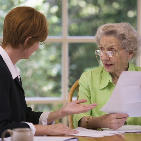 Senior Woman and Lawyer Discussing — Naples, FL — The Law Office of Charles R. Hayes, P.A.