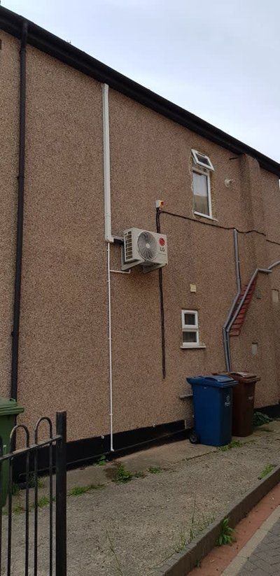 air conditioning system on a brick wall