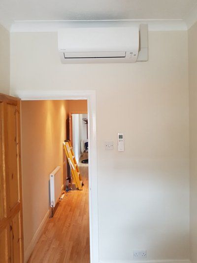 air conditioning on white wall