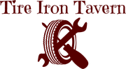 A tire iron tavern logo with a tire and a wrench
