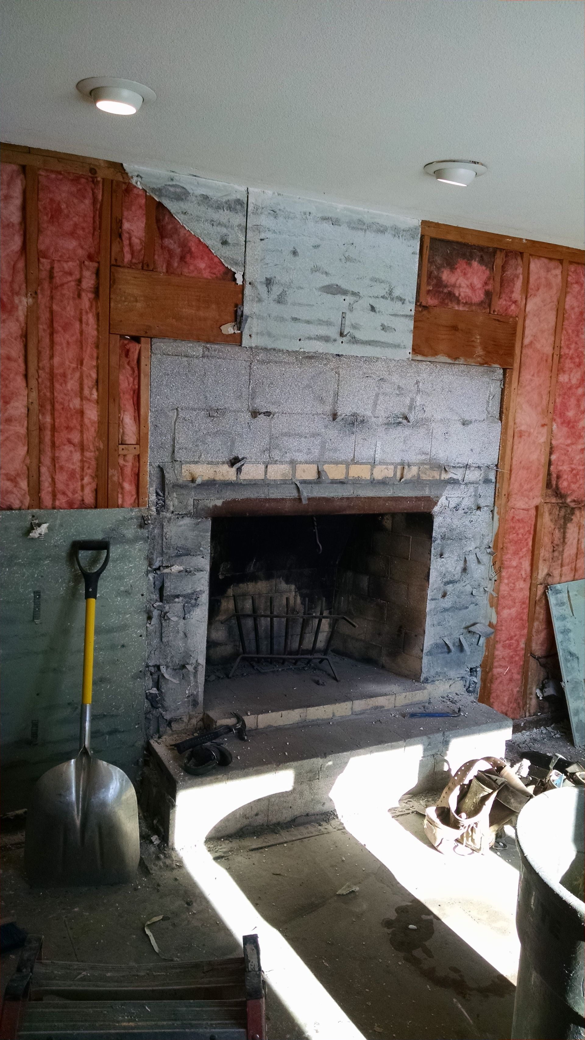 Demo of fireplace remodel - NorthPoint Remodeling