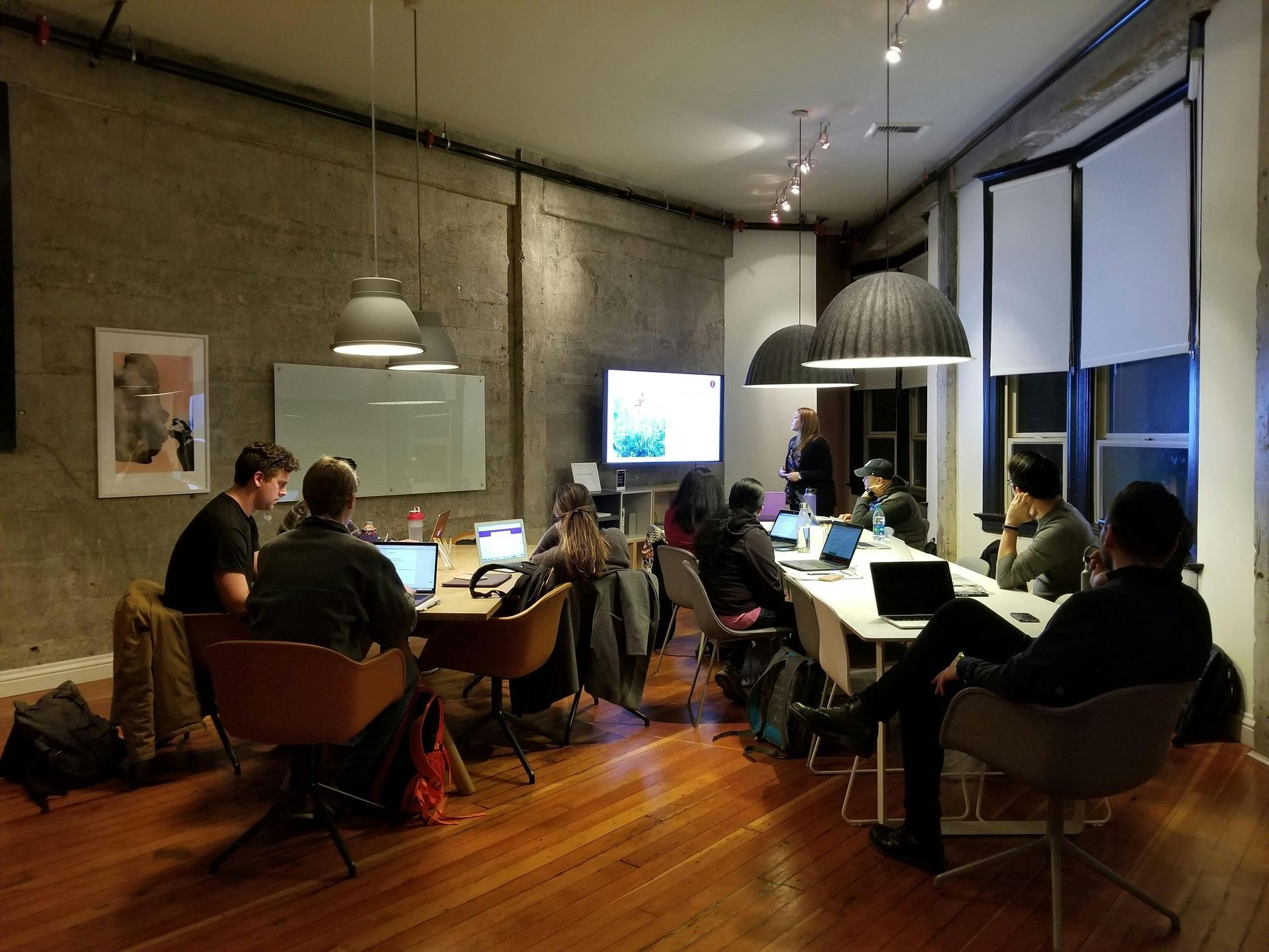 Team meeting around table – creating a winning real estate action plan
