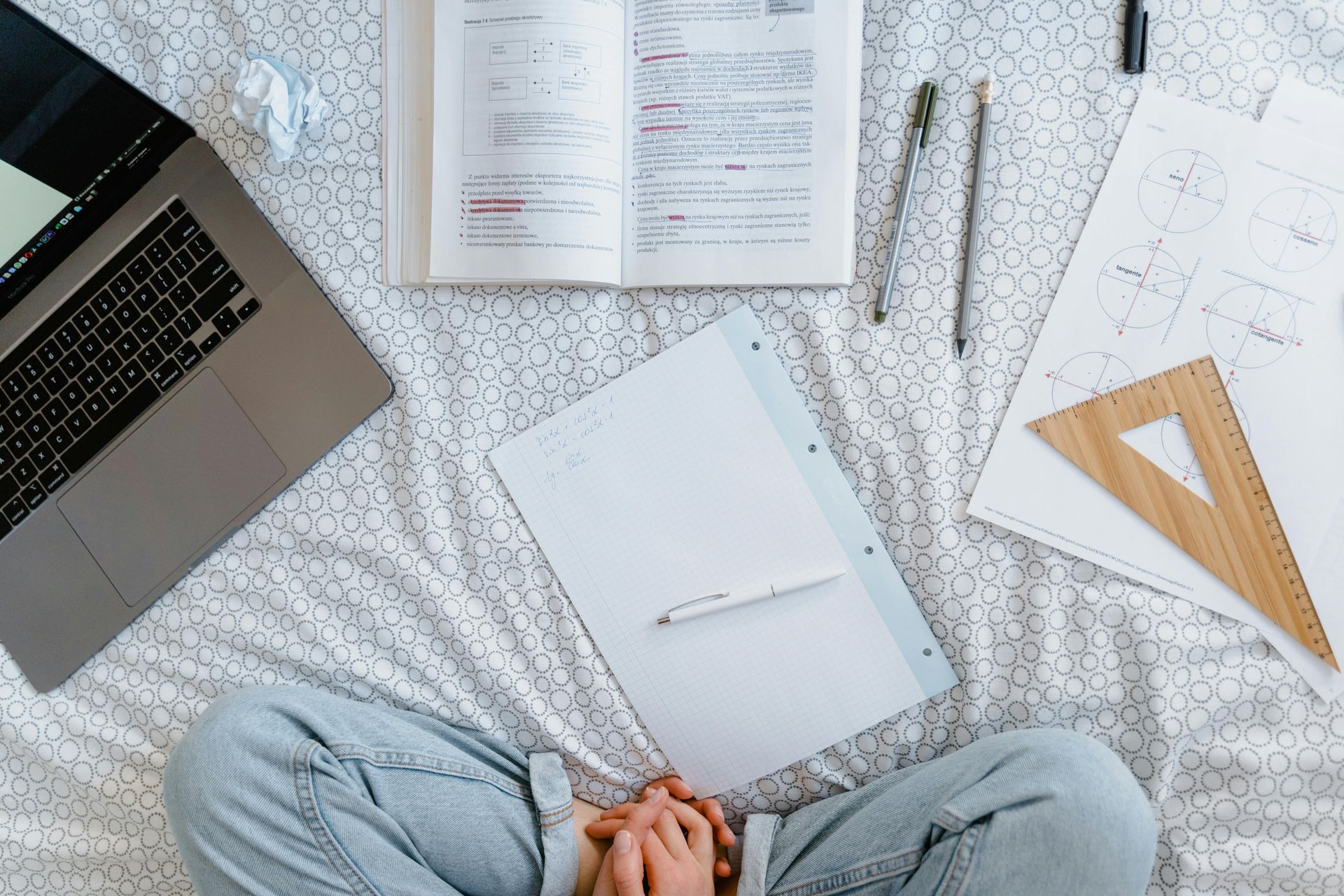 Studying on floor with books – remote learning considerations for homebuyers