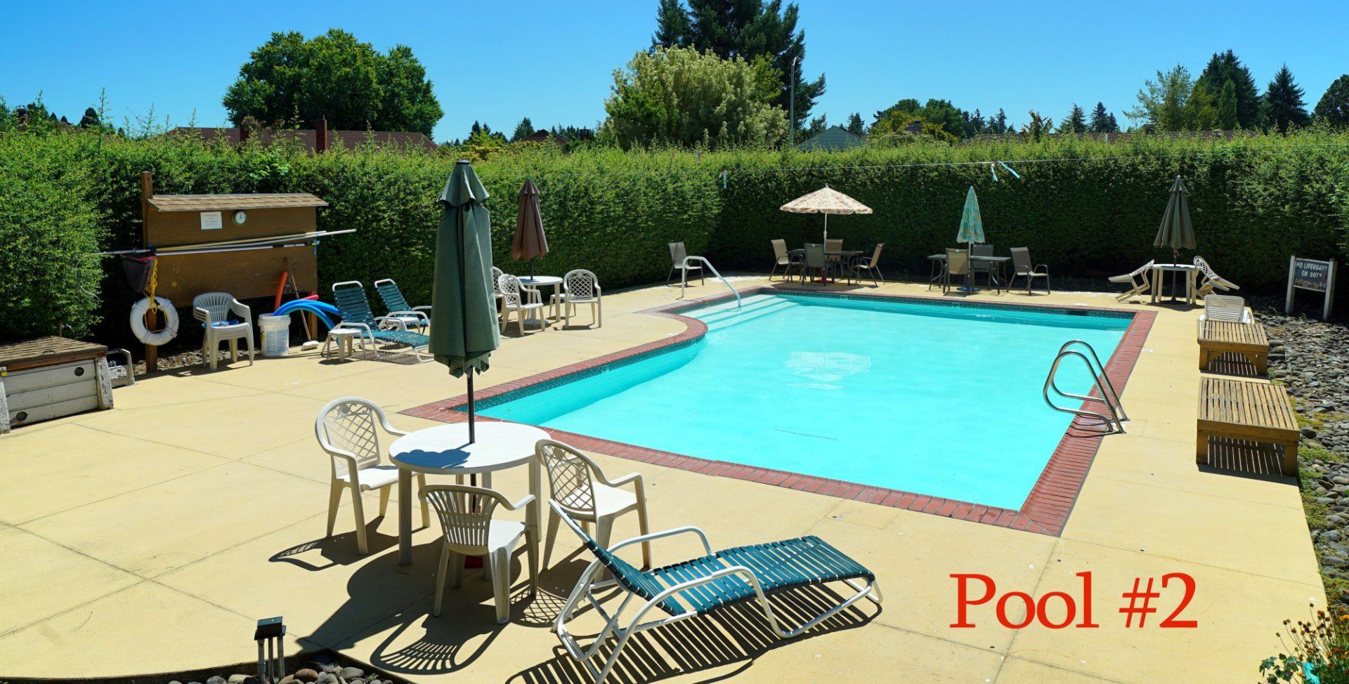 A large swimming pool with the words pool # 2 on the bottom